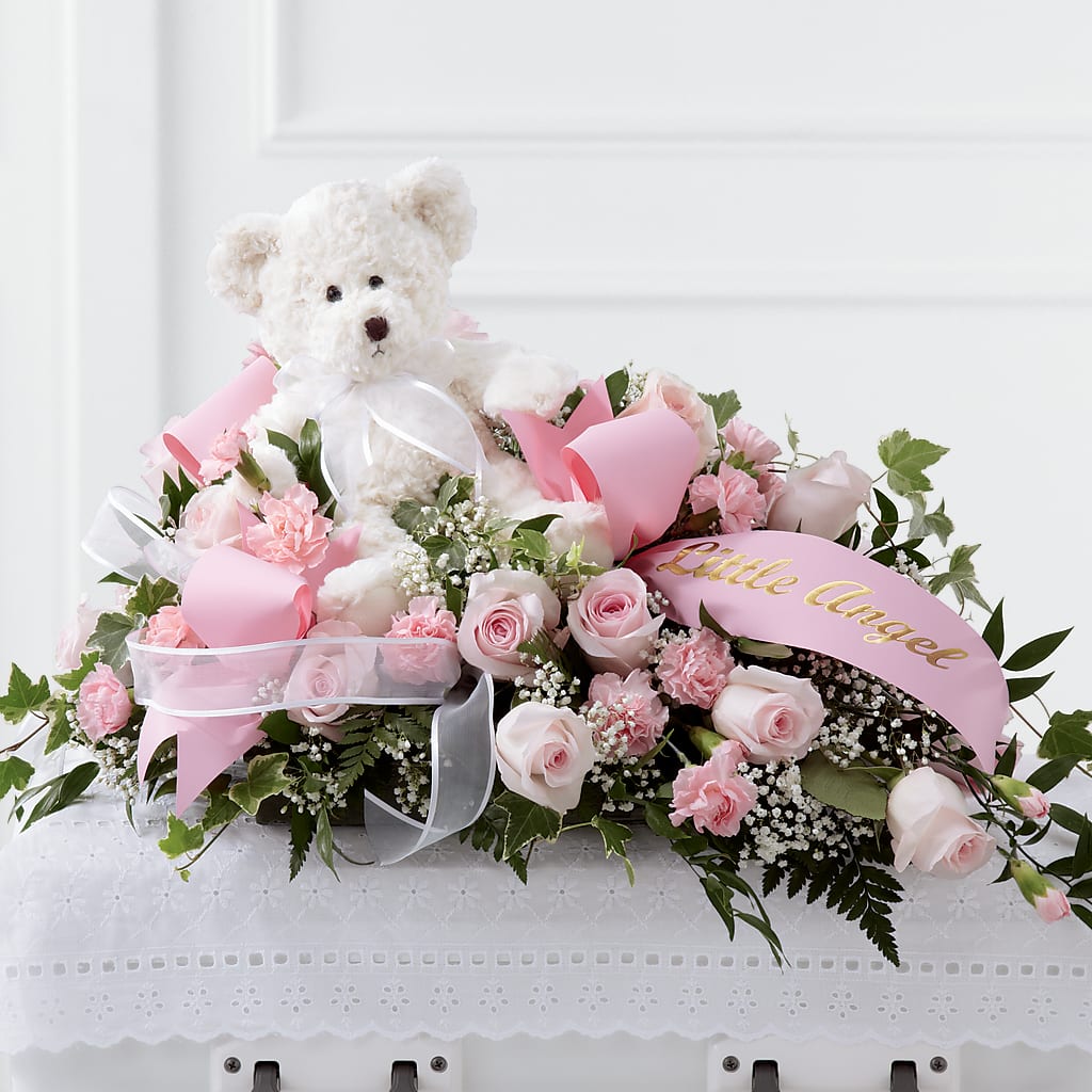 Touch of Sympathy Casket Spray – Wilderness Treasures, Pickford MI
