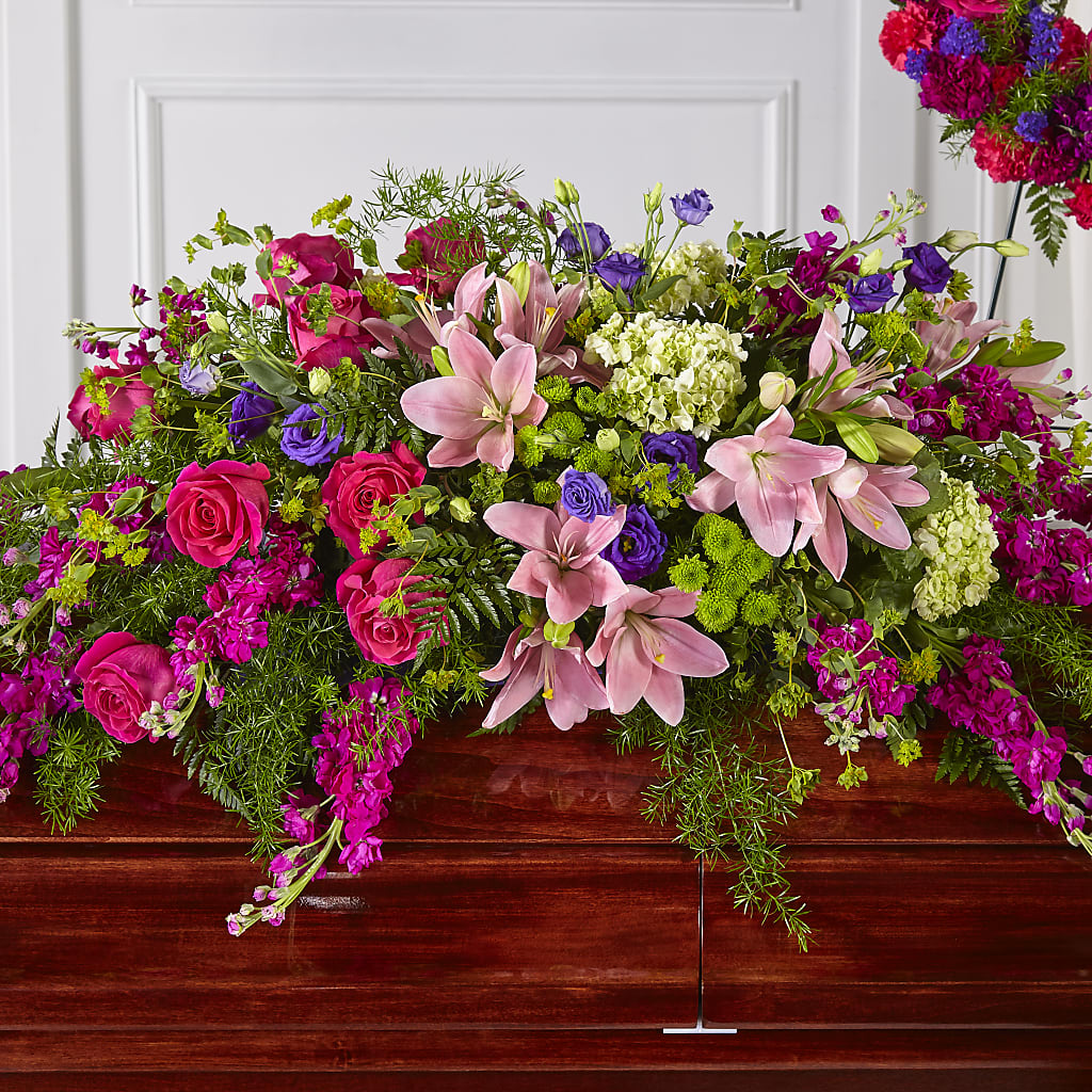 Radiant Tribute Casket Spray – Wilderness Treasures, Pickford MI