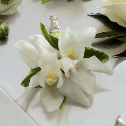 White Mini Cymbidium Boutonniere –  Wilderness Treasures, Pickford MI